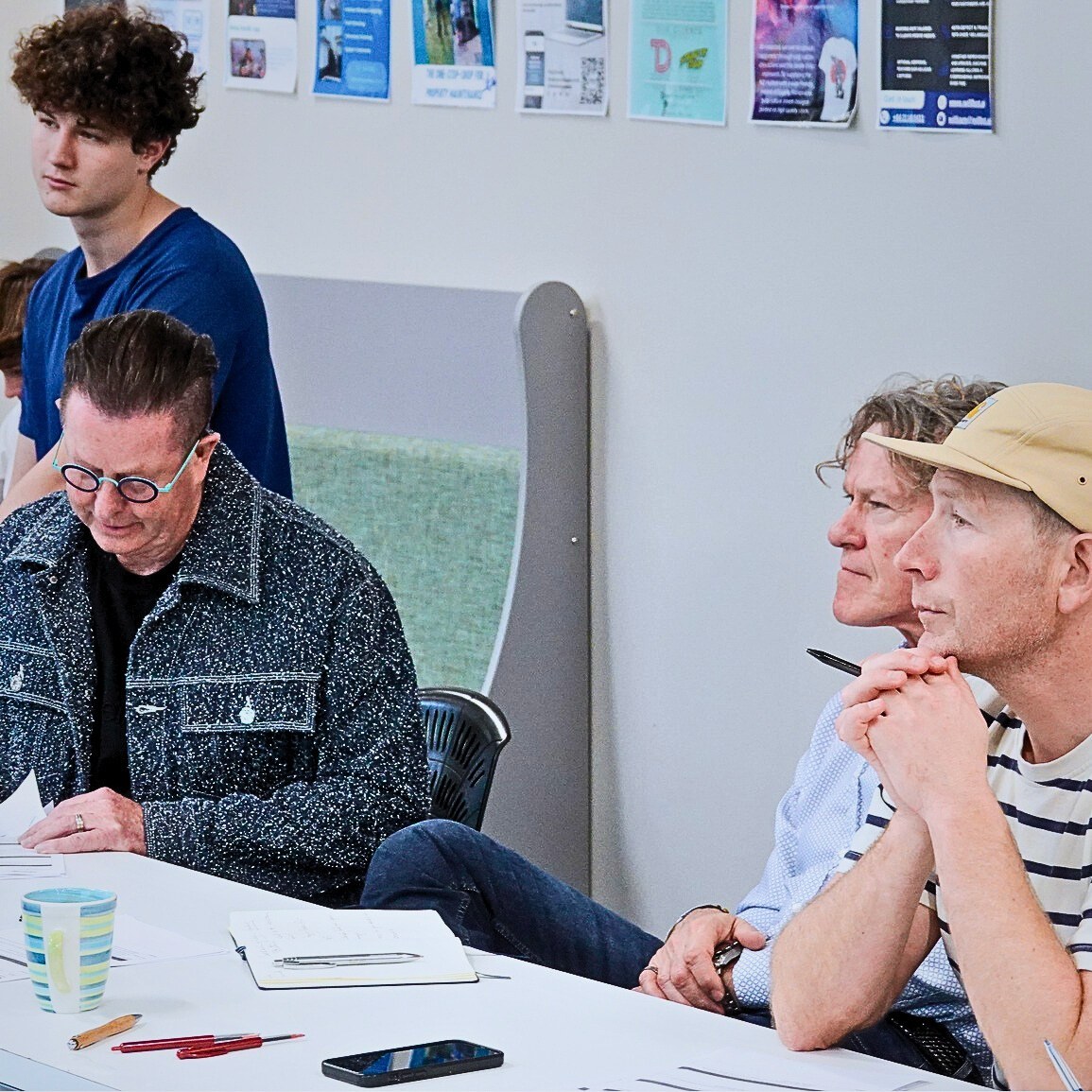 The Dragon's Den judges listening to a pitch